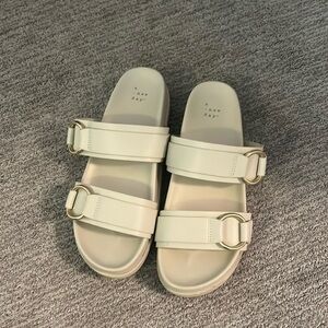 A new day cream, colored sandals